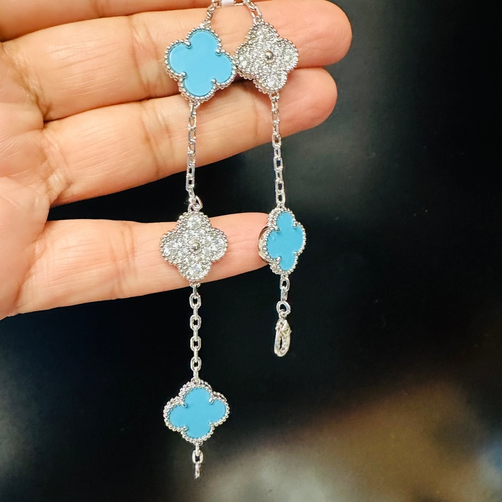 Elegant Silver and Blue Clover Bracelet